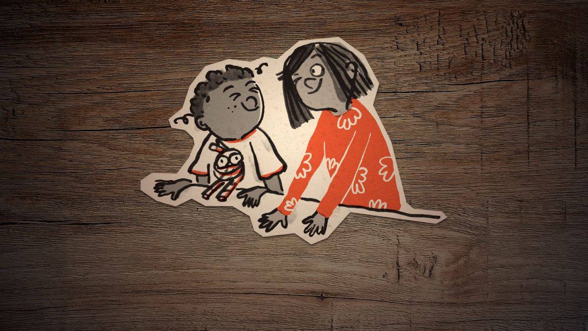 Standbild aus meinem Trailer zu „Bosco Rübe und die Beweisung des Weihnachtsmanns“: zwei ausgeschnittene Papierkinder liegen auf einem Holztisch.